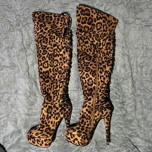 Womens leopard print over the knee boots, stiletto heel.